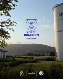 Blue Korpu Bikarinn First Water logo centered over a park landscape with a white water tower labeled Iceland on the right; sponsor logos along the bottom.