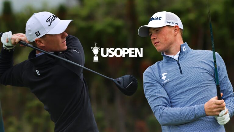 Two male golfers mid-swing with a large US Open logo centered between them on a blurred course background.